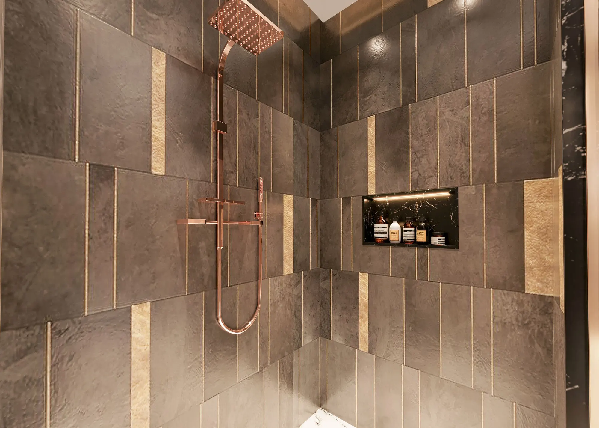 Dark stone-look tiled shower with copper fittings